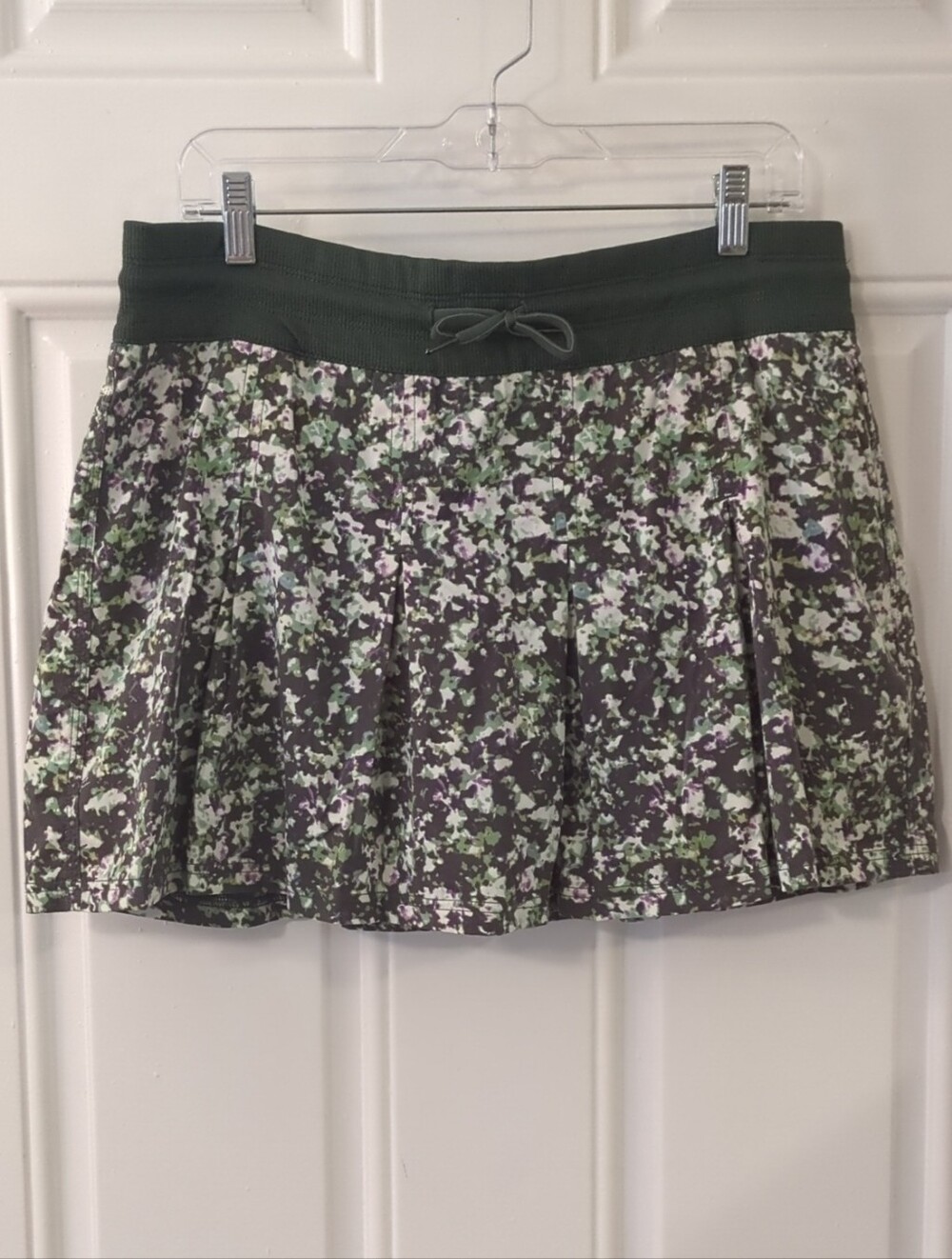 The North Face Floral Pleated Golf Skort in Dark Green and Lavender